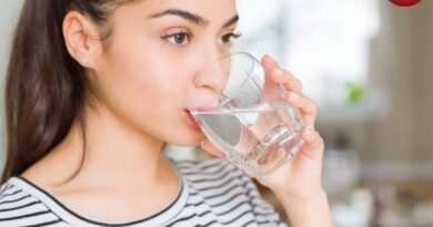 Standing and Drinking Water